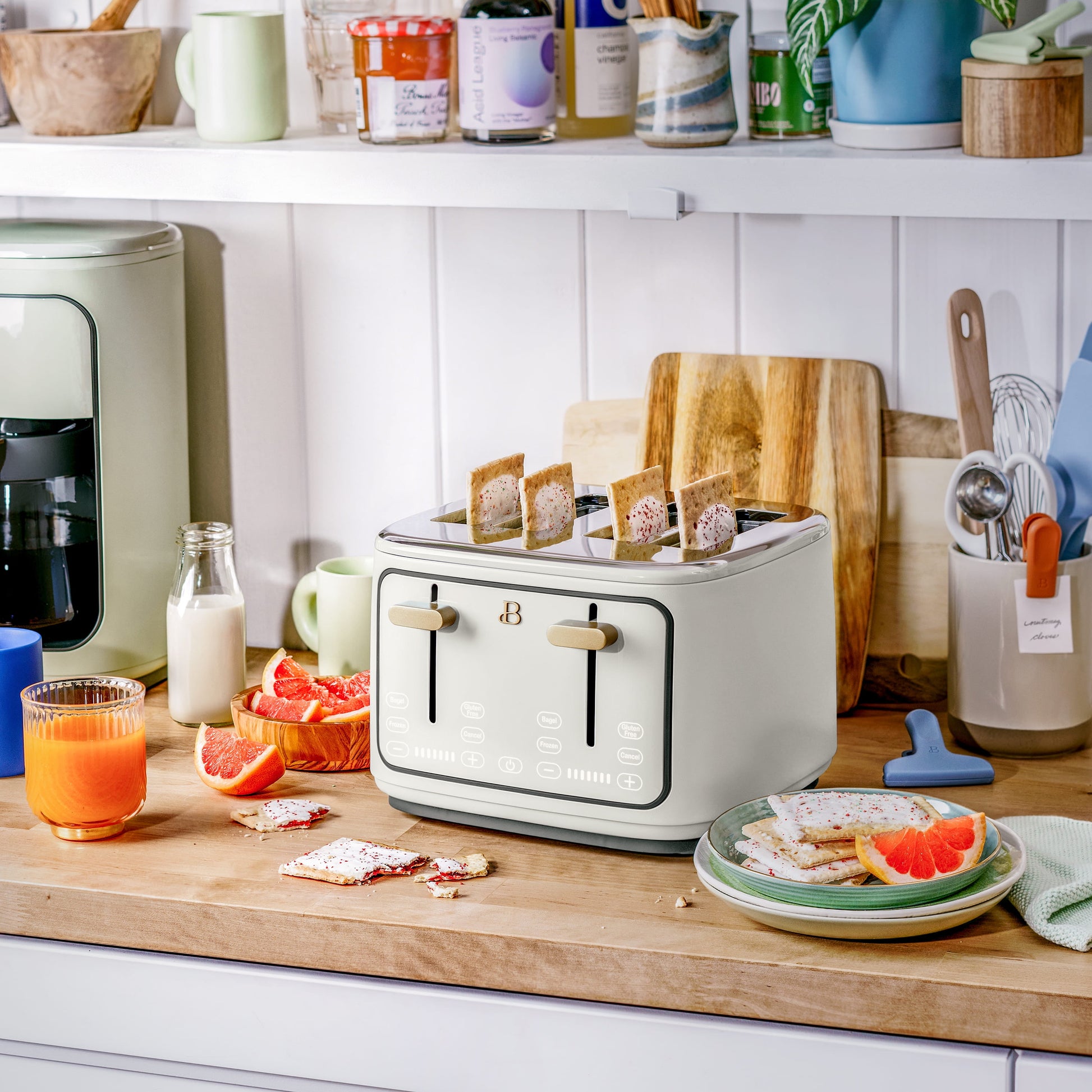 Drew Barrymore's Elegant 4-Slice Touch-Activated Toaster in White Icing