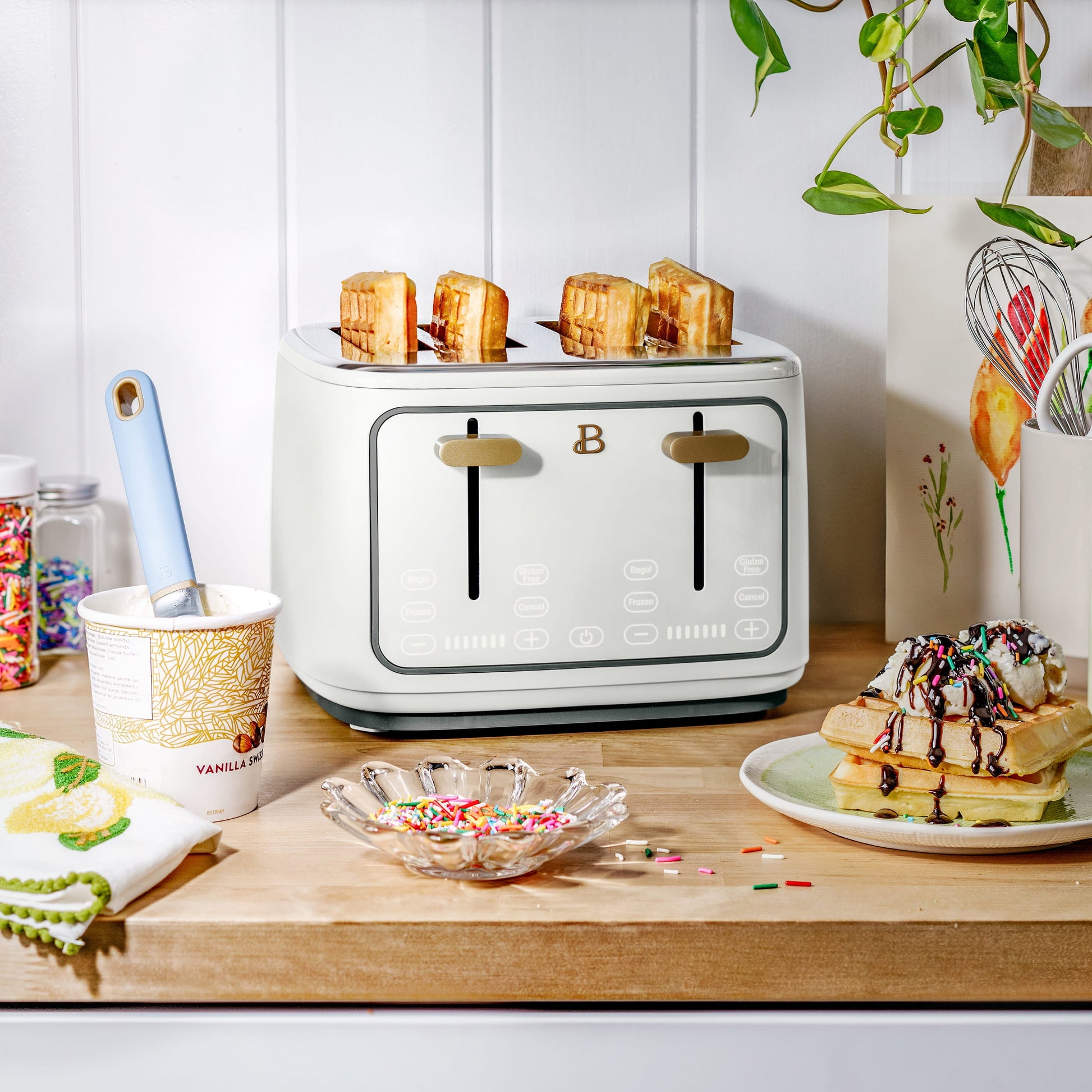 Drew Barrymore's Elegant 4-Slice Touch-Activated Toaster in White Icing